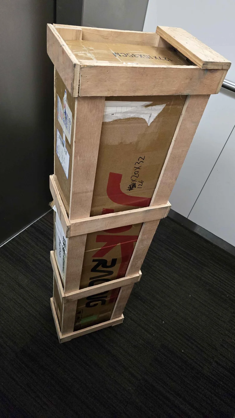 JSK Racing order packed in a wooden shipping crate